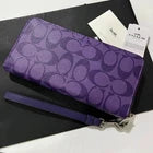COACH Women's Long Zip-Around Wallet in Signature Canvas – Sport Purple C4452