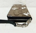 COACH x PEANUTS Snoopy & Woodstock Long Zip Wallet – Brown Multi Signature Canvas