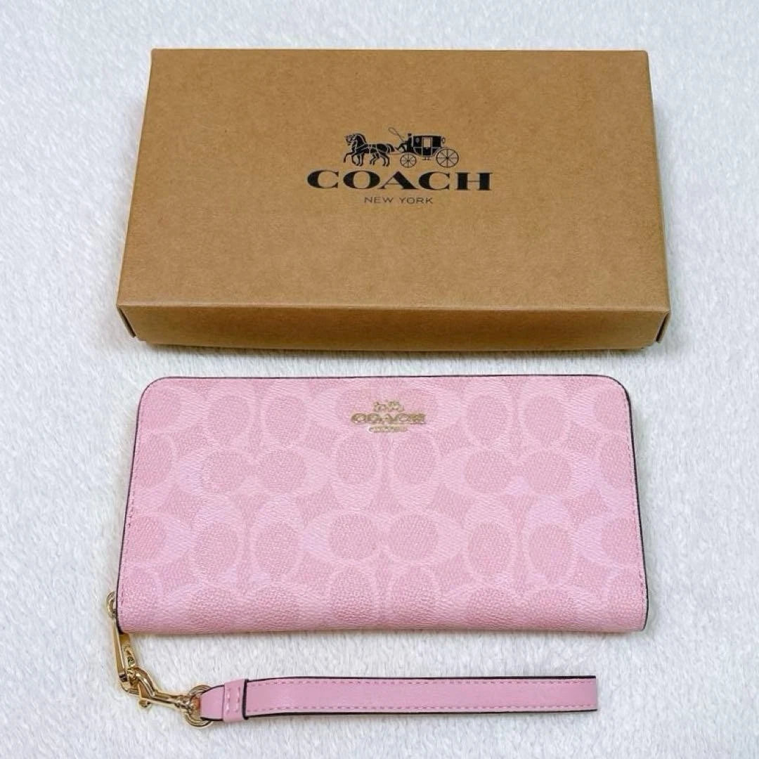 Product Title: COACH Pink Signature Long Wallet with Strap – Round Snap Closure
